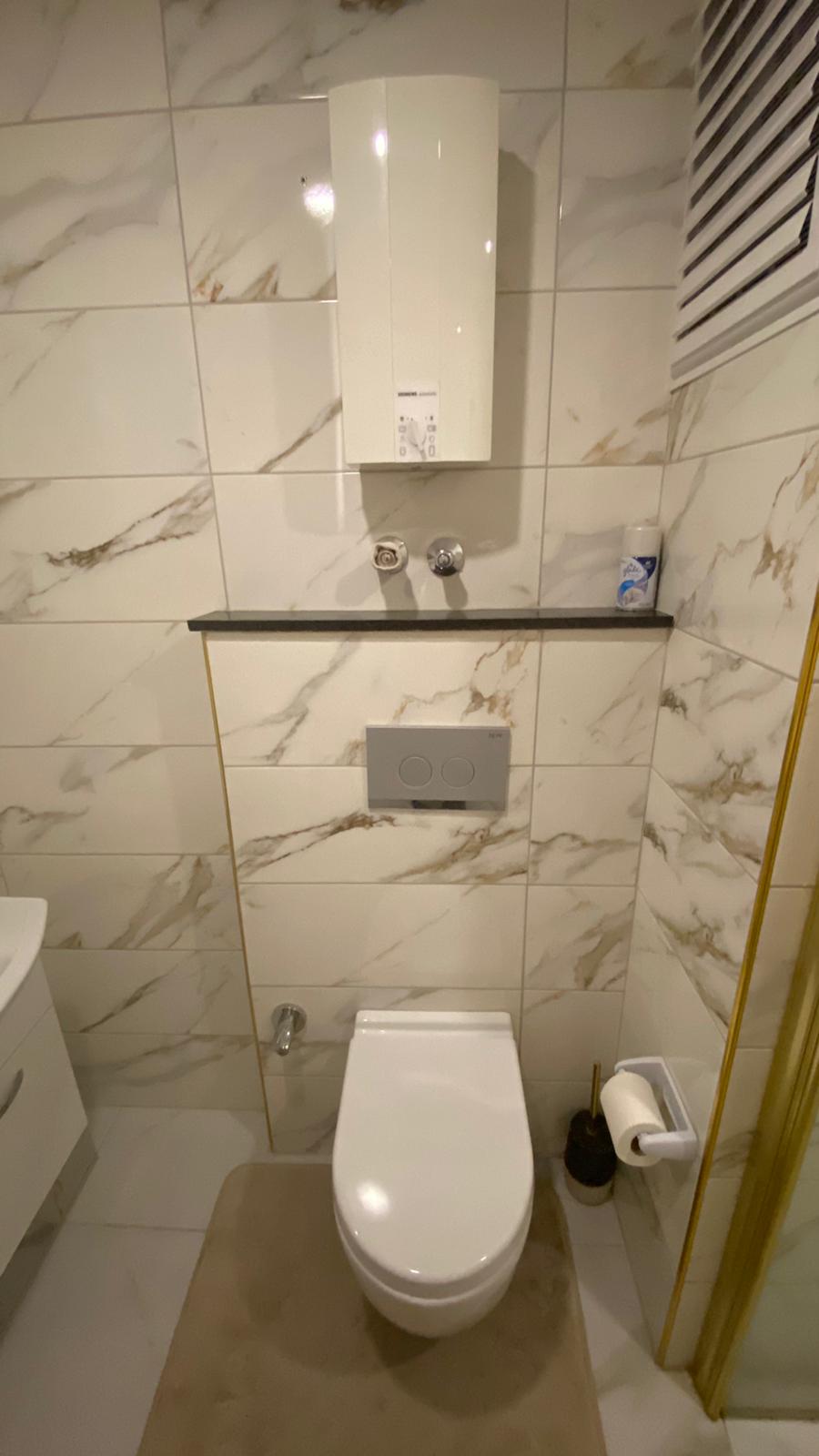 Двухкомнатная квартира в 200 метрах от моря в Махмутларе, 70 кв.м. фото 17