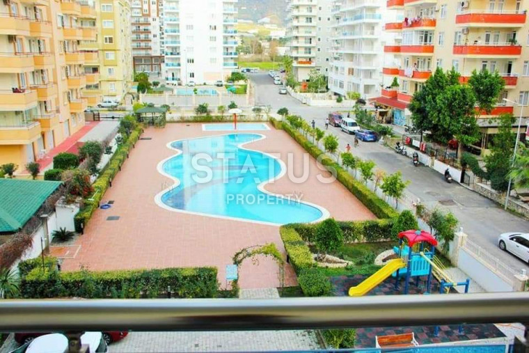 Меблированная квартира 1+1 в элитном комплексе у моря, 65 м2. Махмутлар, Алания. фото 1