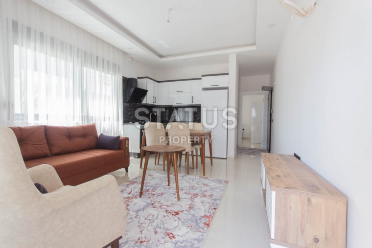 Меблированная квартира 1+1 в новом комплексе возле Наулы, 55 м2. Махмутлар, Алания. фото 1