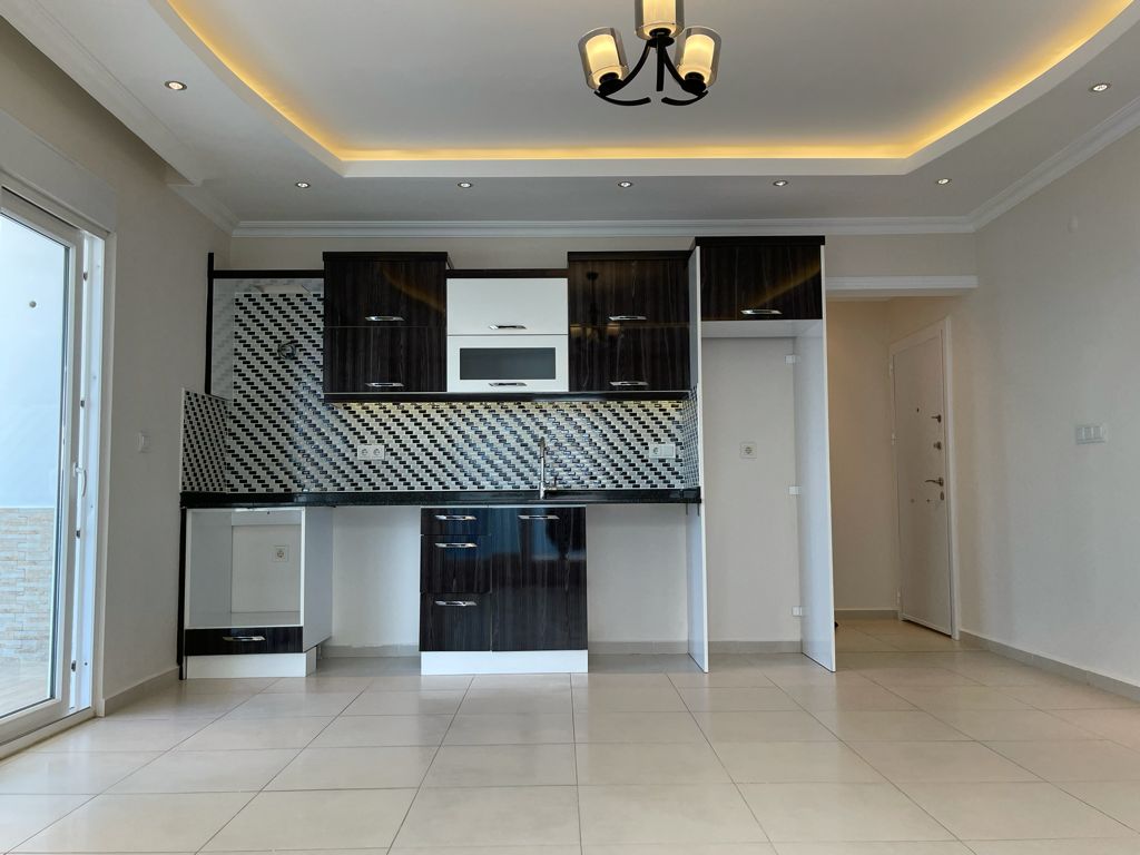 Крупнометражная квартира 1+1 в центре Махмутлара, 65 м2. фото 9