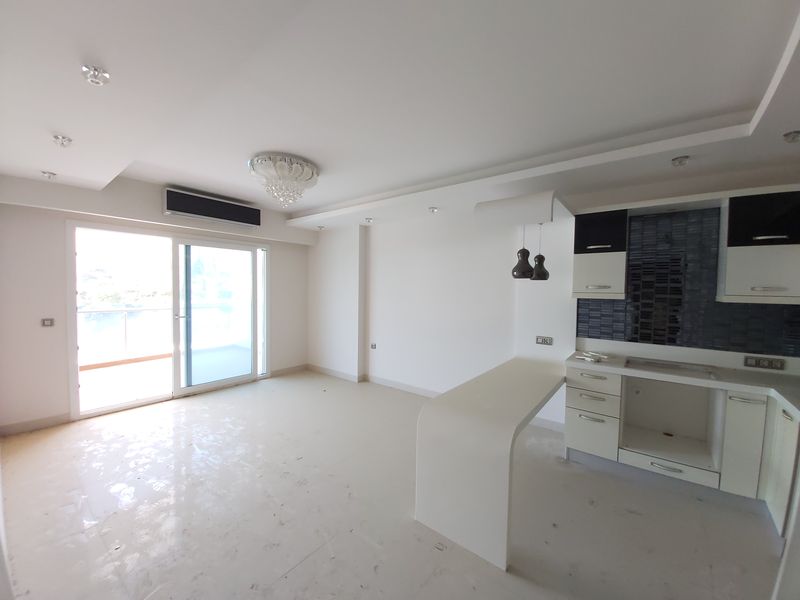 Просторная двухкомнатная квартира в элитном комплексе в Махмутларе, 70 м2 фото 20