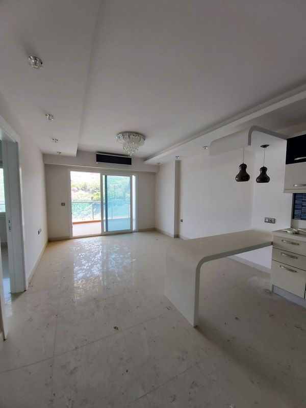 Просторная двухкомнатная квартира в элитном комплексе в Махмутларе, 70 м2 фото 27