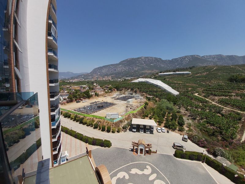 Просторная двухкомнатная квартира в элитном комплексе в Махмутларе, 70 м2 фото 31