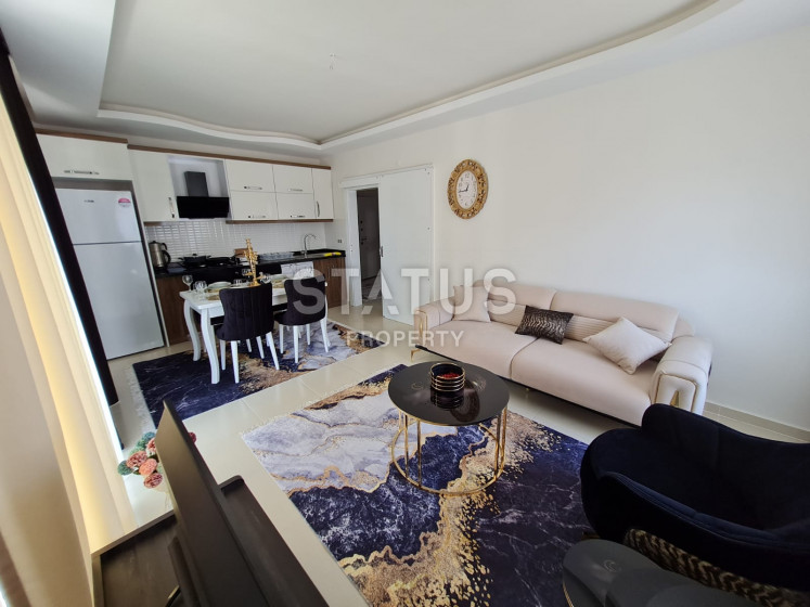 Квартира 1+1 с новой мебелью в Махмутларе, 65 м2 фото 1