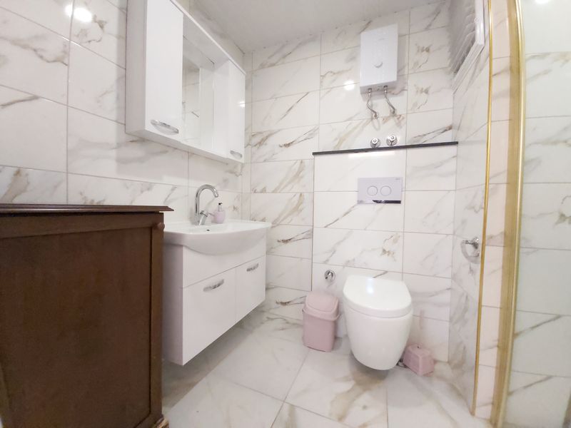 Меблированная квартира 1+1, 65 м2 в центре Махмутлара, 200 метров от пляжа. фото 8