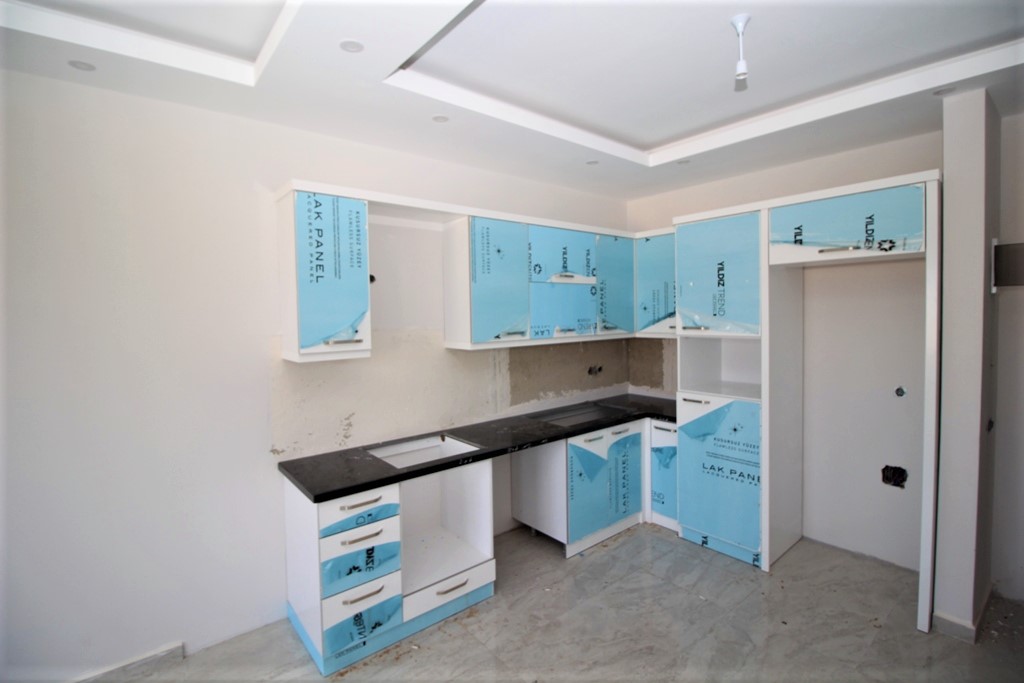 Новая квартира с ремонтом в центре Алании, в которой никто не жил!  60 кв.м. фото 4