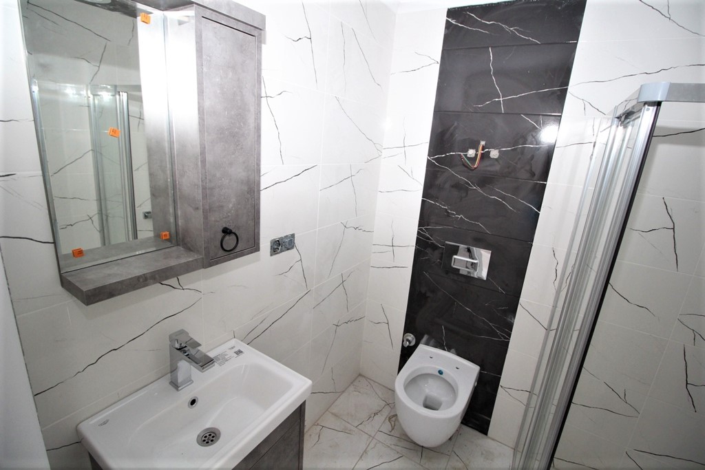 Новая квартира с ремонтом в центре Алании, в которой никто не жил!  60 кв.м. фото 8