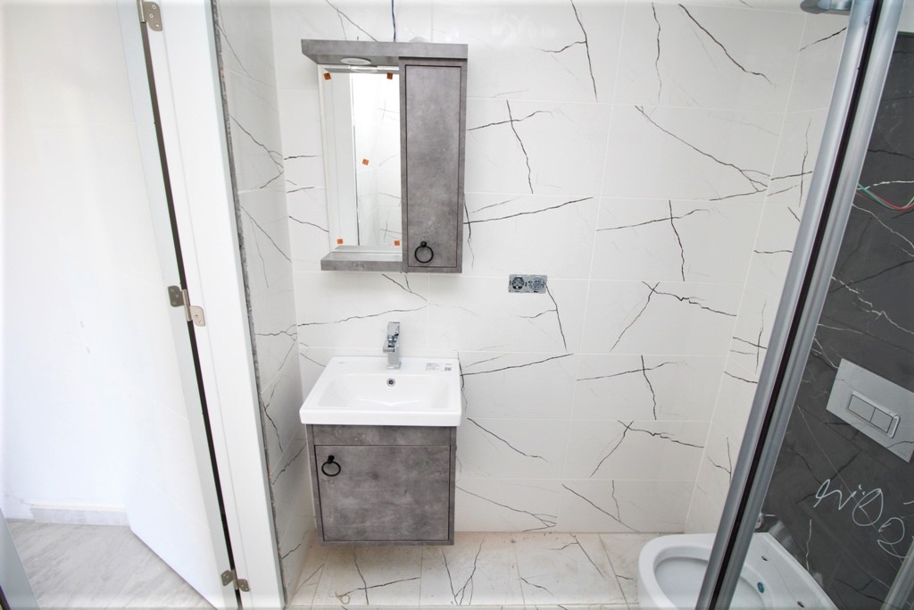 Новая квартира с ремонтом в центре Алании, в которой никто не жил!  60 кв.м. фото 11