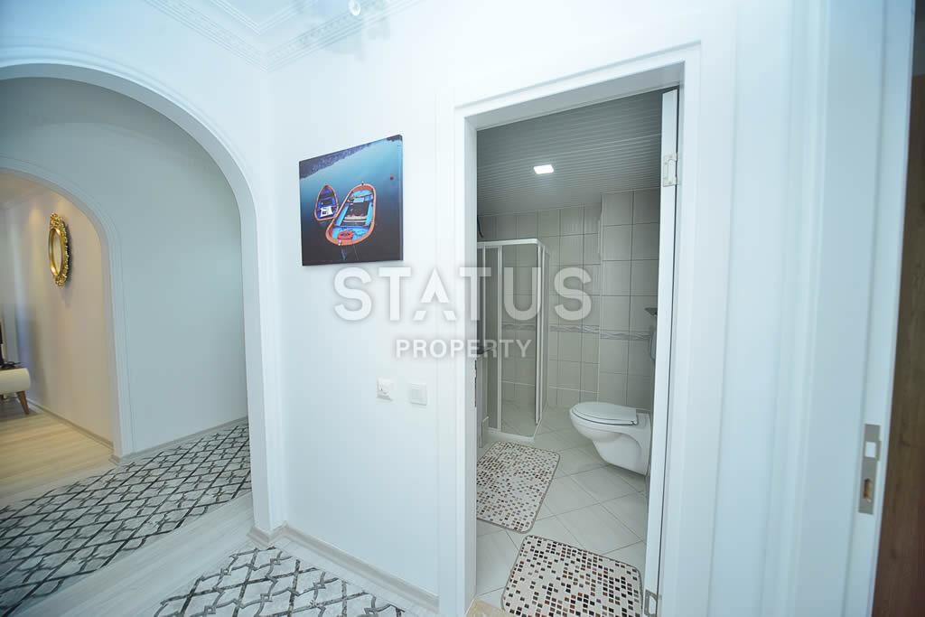 Шикарные трехкомнатные апартаменты в 100 м от моря в центре района Махмутлар, 120 м2 фото 12