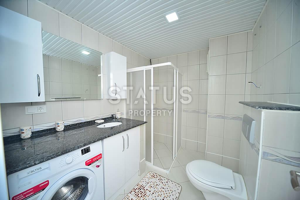 Шикарные трехкомнатные апартаменты в 100 м от моря в центре района Махмутлар, 120 м2 фото 14