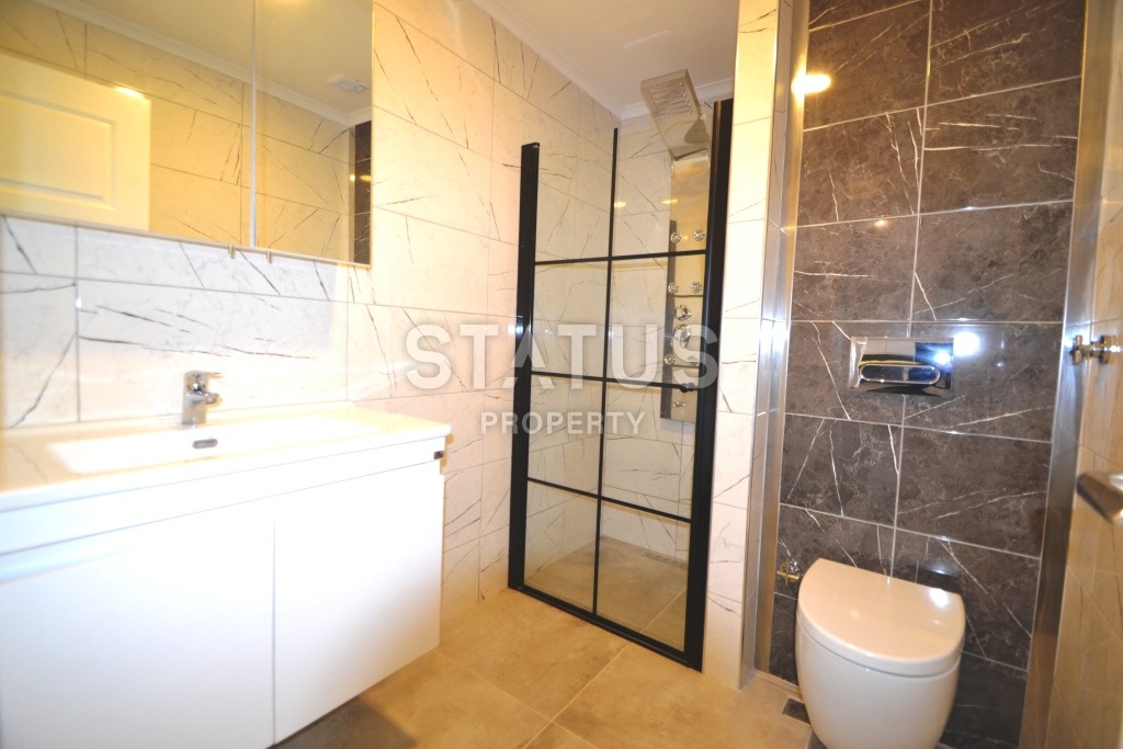 Трехкомнатная квартира всего 100 метров от побережья района Махмутлар, 90 м2. фото 11