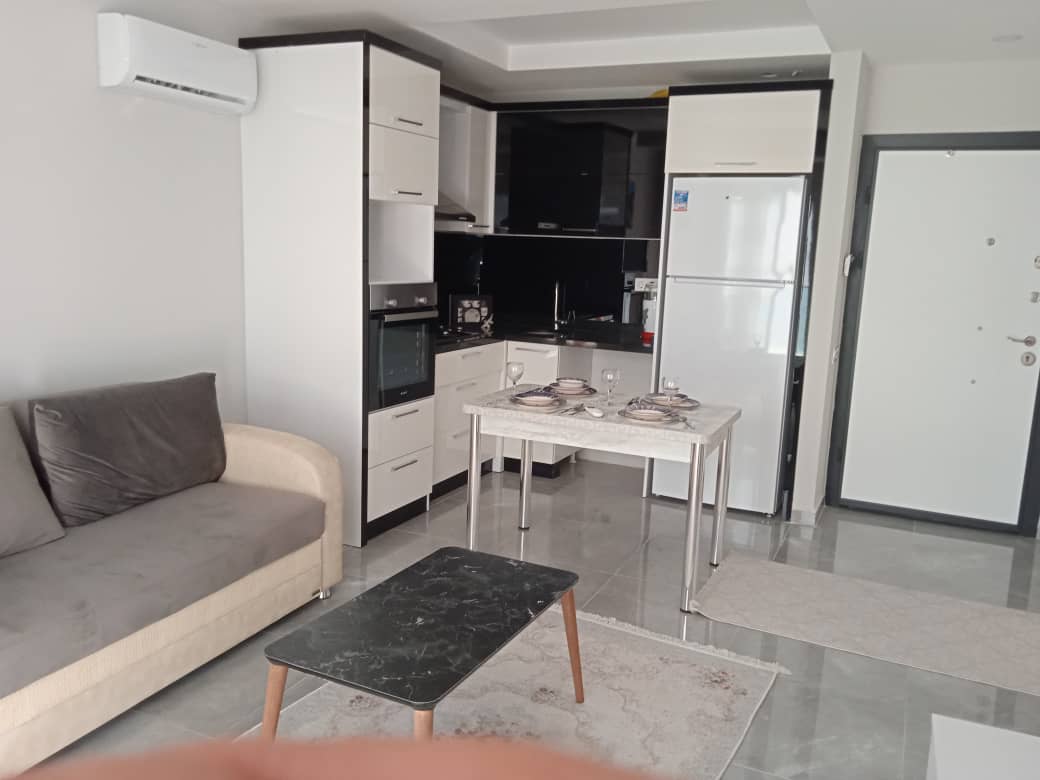 Новая квартира с мебелью в Махмутларе, 55 м2 фото 7