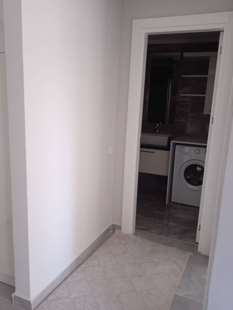 Новая квартира с мебелью в Махмутларе, 55 м2 фото 12