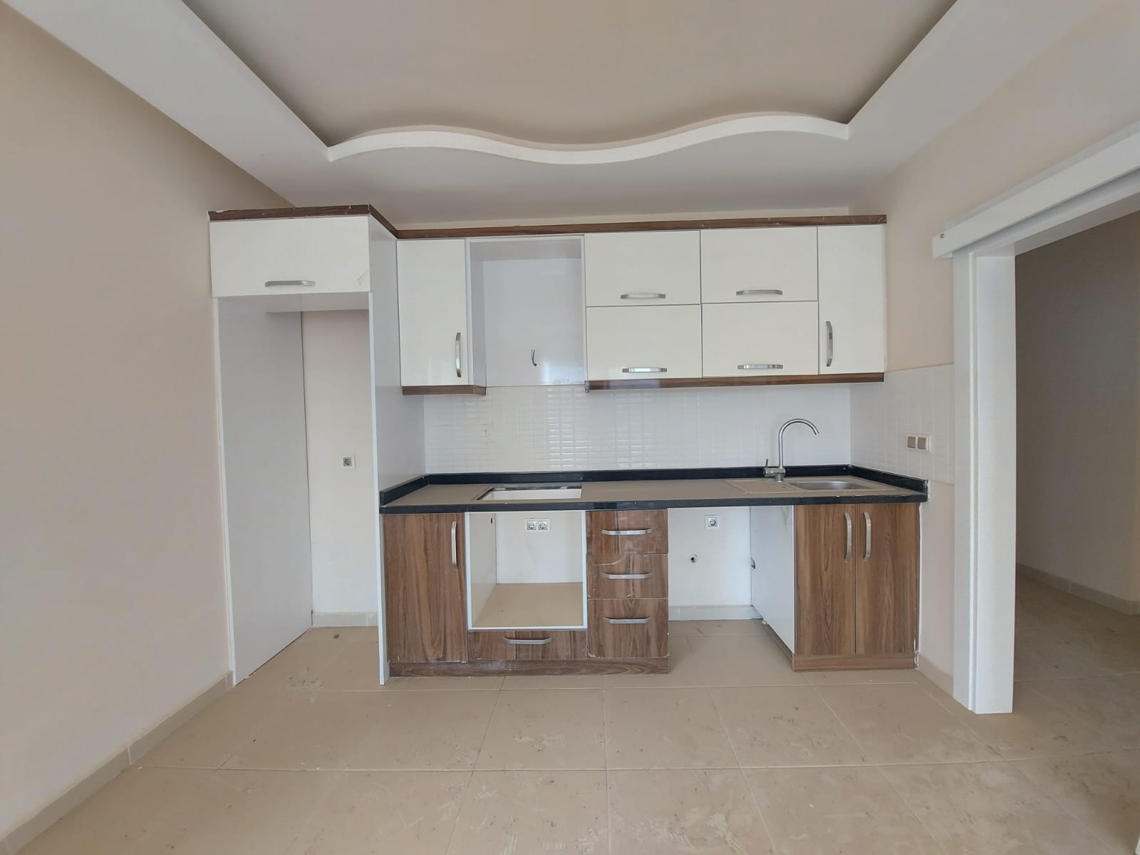 Двухкомнатная квартира планировки 1+1, общей площадью 68 кв.м в Махмутларе фото 6