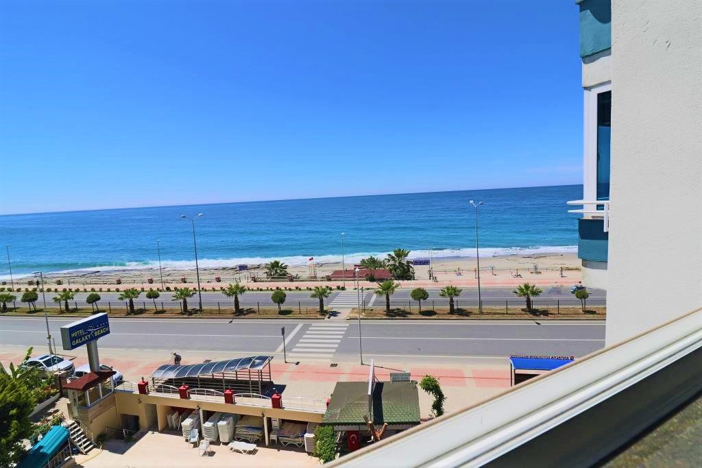 Меблированная квартира 2+1 с прямым видом на море на первой береговой линии. 100м.кв. фото 5