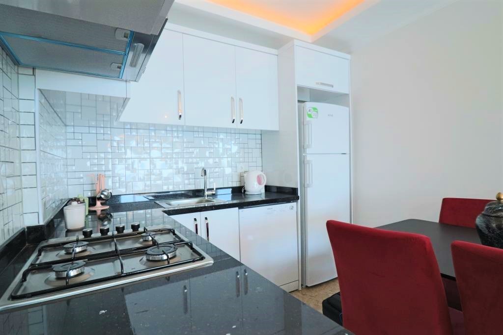 Меблированная квартира 2+1 с прямым видом на море на первой береговой линии. 100м.кв. фото 8