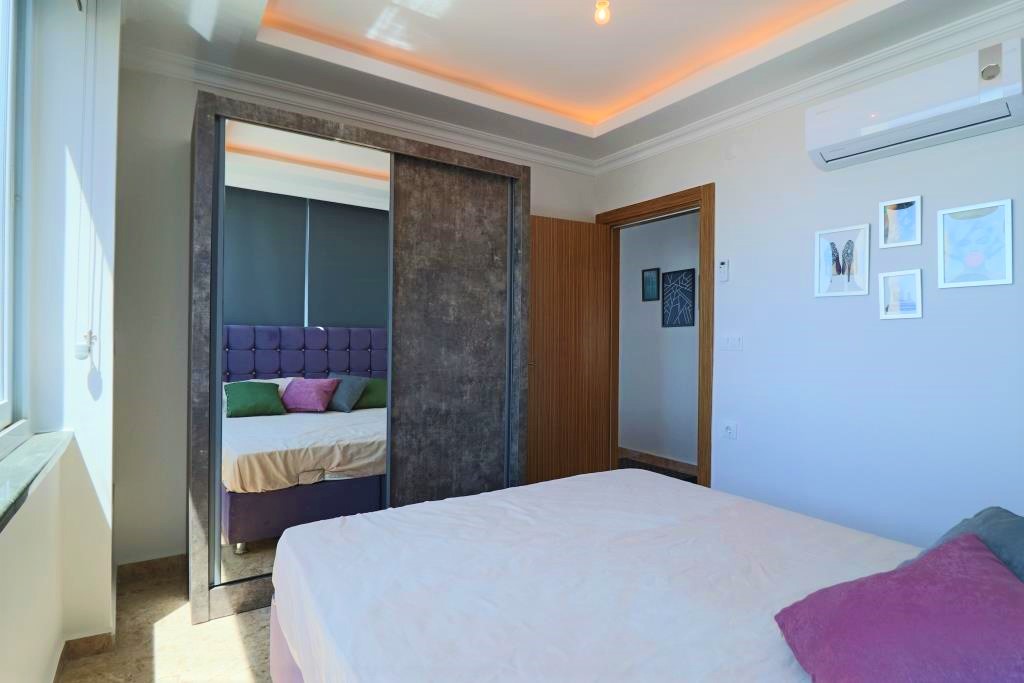 Меблированная квартира 2+1 с прямым видом на море на первой береговой линии. 100м.кв. фото 24