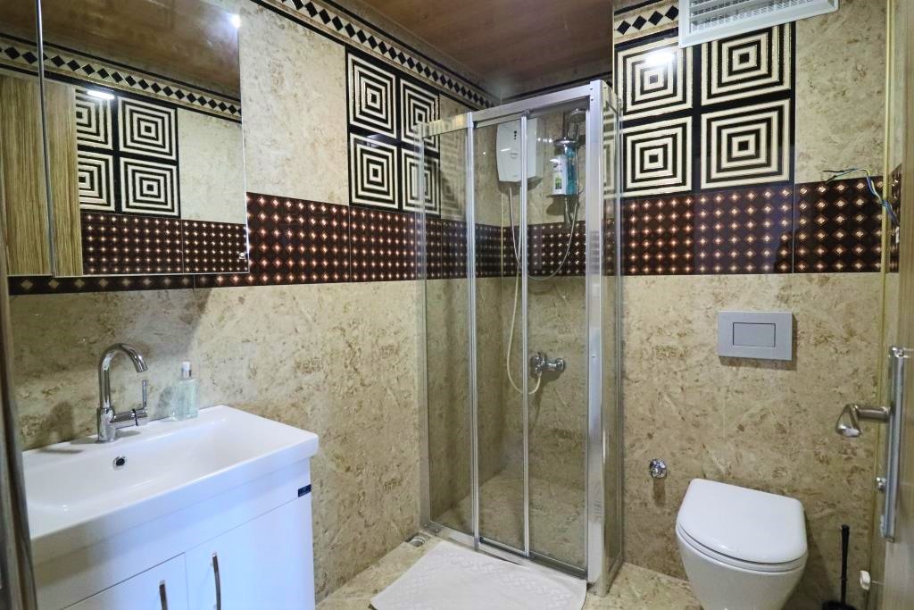 Меблированная квартира 2+1 с прямым видом на море на первой береговой линии. 100м.кв. фото 25