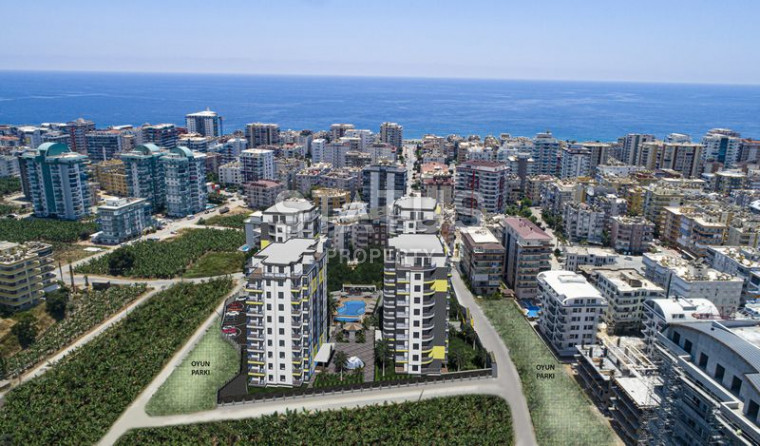 Новый проект на этапе строительства в Махмутларе, выгодные инвестиции! 54-164 м2 фото 1