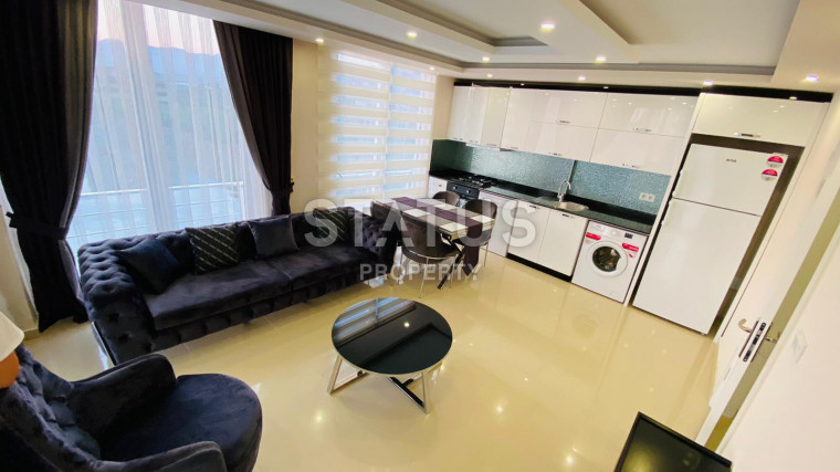 Квартира 1+1 с новой мебелью в Махмутларе, 65 м2 фото 1