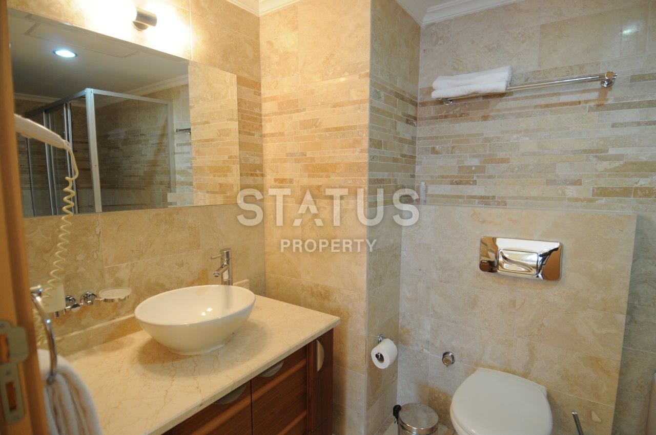 Furnished apartments in a calm and beautiful area of Kargicak with a sea view фото 8