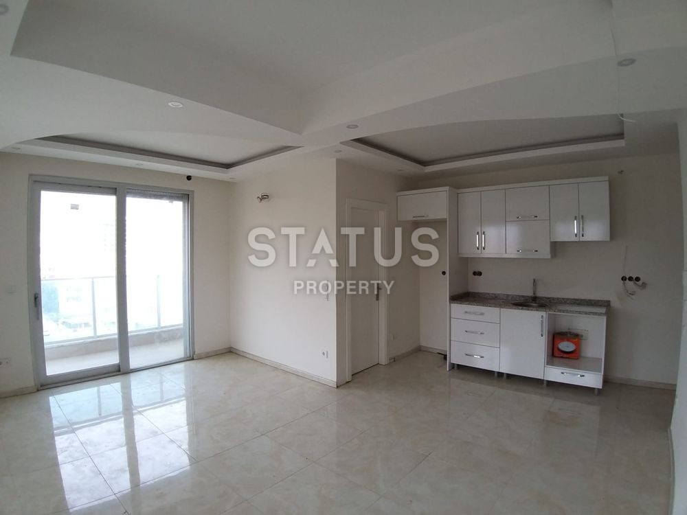 Квартира-студия с боковым видом на море в районе Махмутлар, 42 кв. м. фото 4