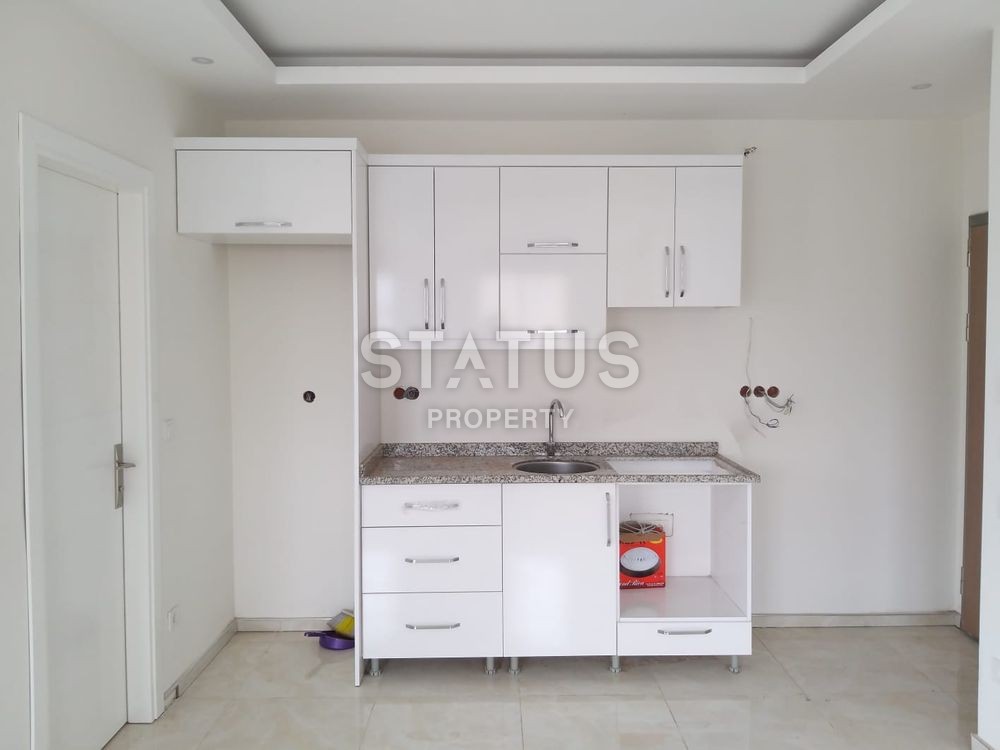 Квартира-студия с боковым видом на море в районе Махмутлар, 42 кв. м. фото 5