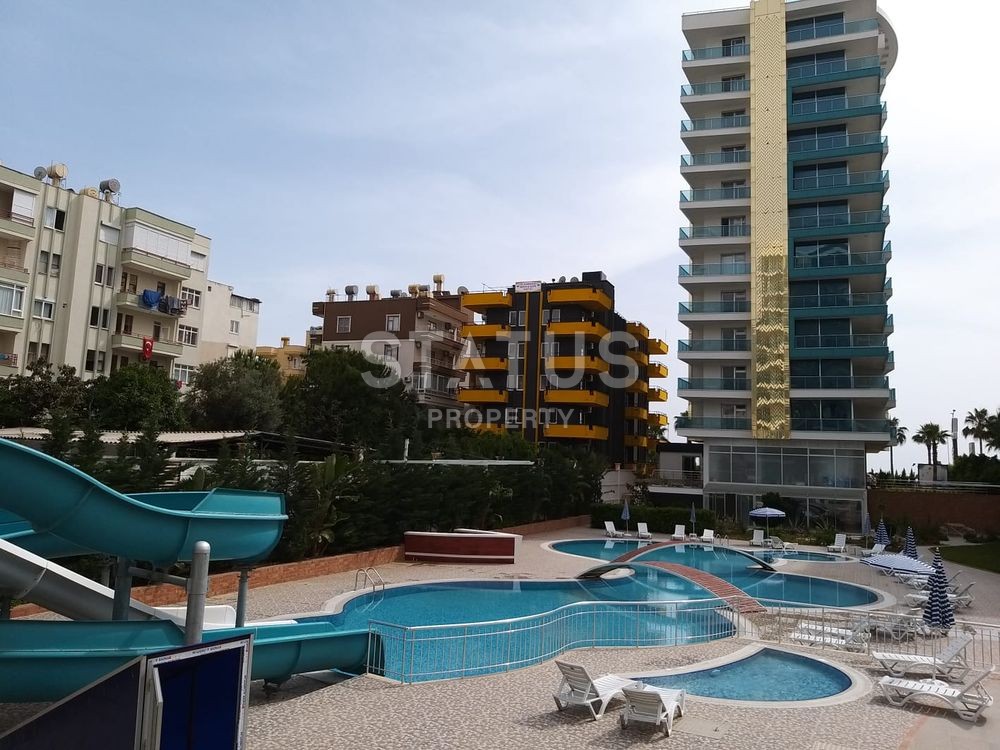 Квартира-студия с боковым видом на море в районе Махмутлар, 42 кв. м. фото 11