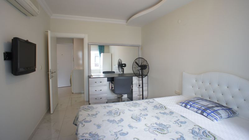 Apartment 1+1 furnished in the center of the popular area of Mahmutlar, 60 m2. фото 12