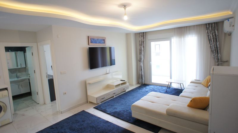 Apartment 1+1 furnished in the center of the popular area of Mahmutlar, 60 m2. фото 15