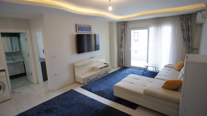 Apartment 1+1 furnished in the center of the popular area of Mahmutlar, 60 m2. фото 17