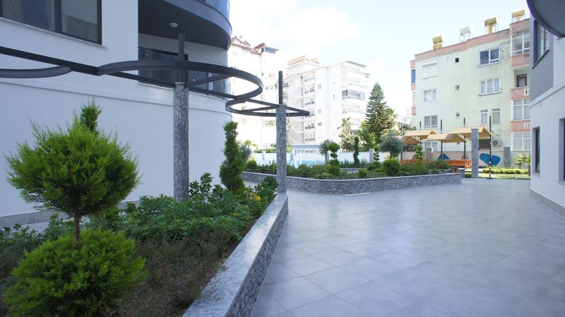 Квартира 2+1 в новом комплексе в 5 минутах от пляжа Клеопатры 90 м2. Центр, Алания. фото 19