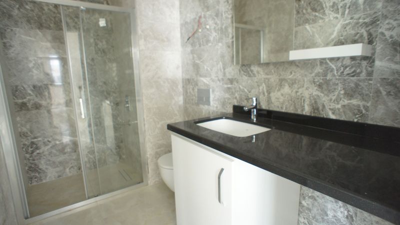 Квартира 2+1 в новом комплексе в 5 минутах от пляжа Клеопатры 90 м2. Центр, Алания. фото 29