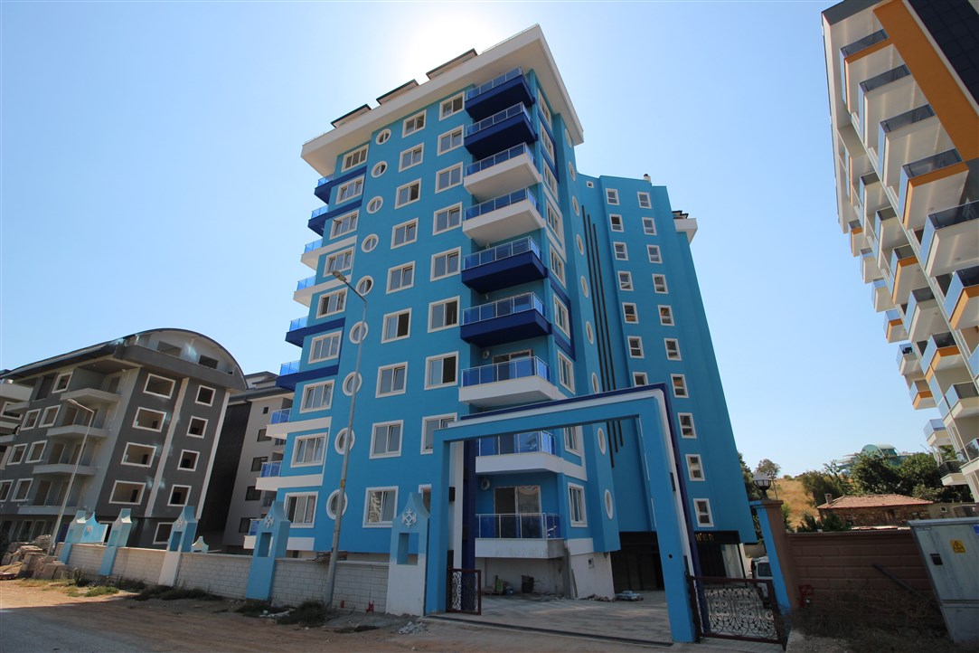 Квартира 1+1, в 500 метрах от моря в новом доме Махмутлар, 60 кв.м. фото 4