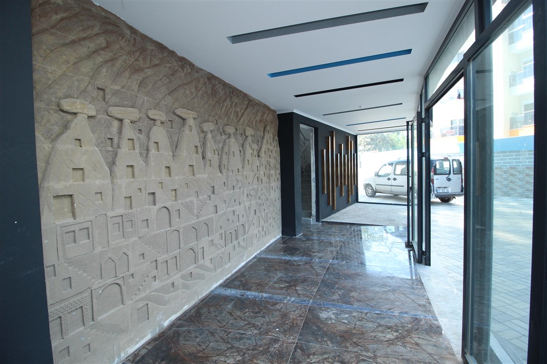 Квартира 1+1, в 500 метрах от моря в новом доме Махмутлар, 60 кв.м. фото 7