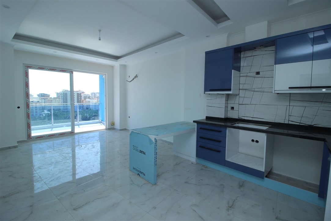 Квартира 1+1, в 500 метрах от моря в новом доме Махмутлар, 60 кв.м. фото 10