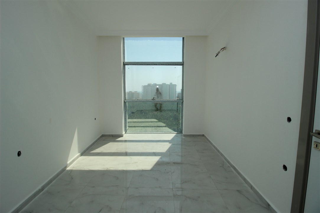 Квартира 1+1, в 500 метрах от моря в новом доме Махмутлар, 60 кв.м. фото 18