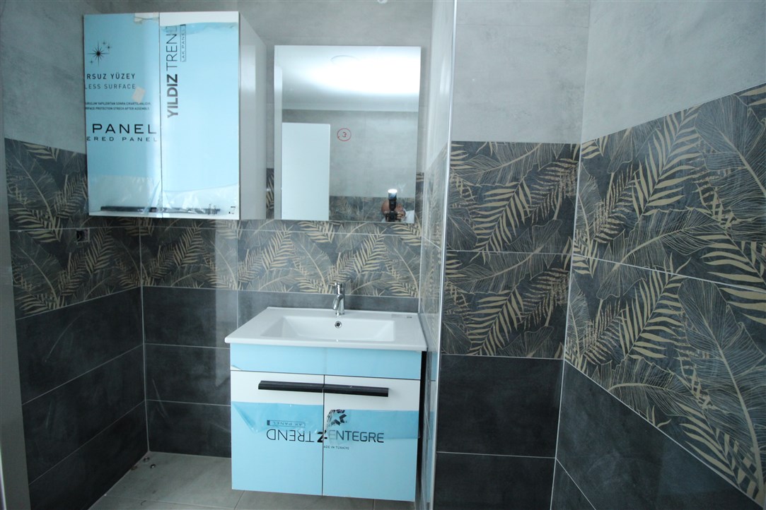 Квартира 1+1, в 500 метрах от моря в новом доме Махмутлар, 60 кв.м. фото 20