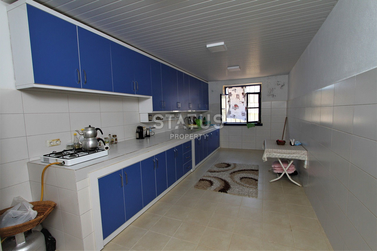 Земельный участок с большим домом и теплицей в Ходжалар, Алания. фото 6