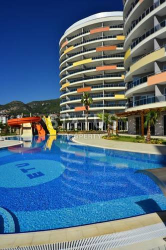 Большие апартаменты 1+1 с панорамой на море, 80 м2. Джикджилли, Алания. фото 8