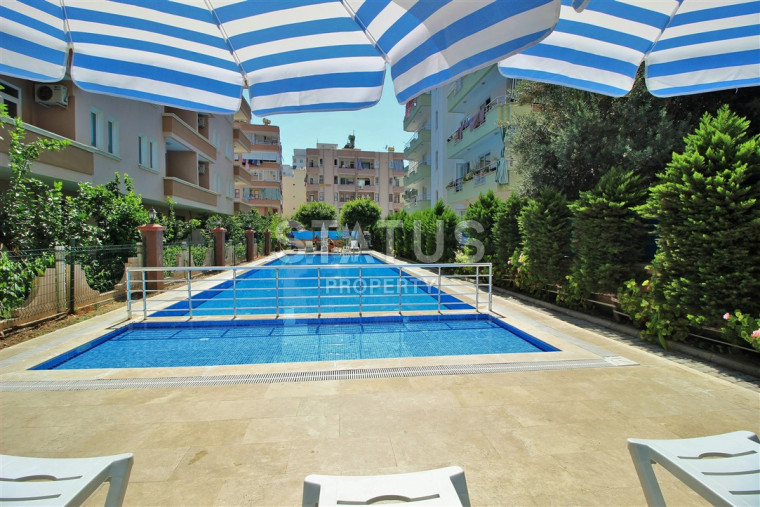 Меблированная квартира 1+1 в пяти минутах от моря, 60 м2. Махмутлар, Алания. фото 1