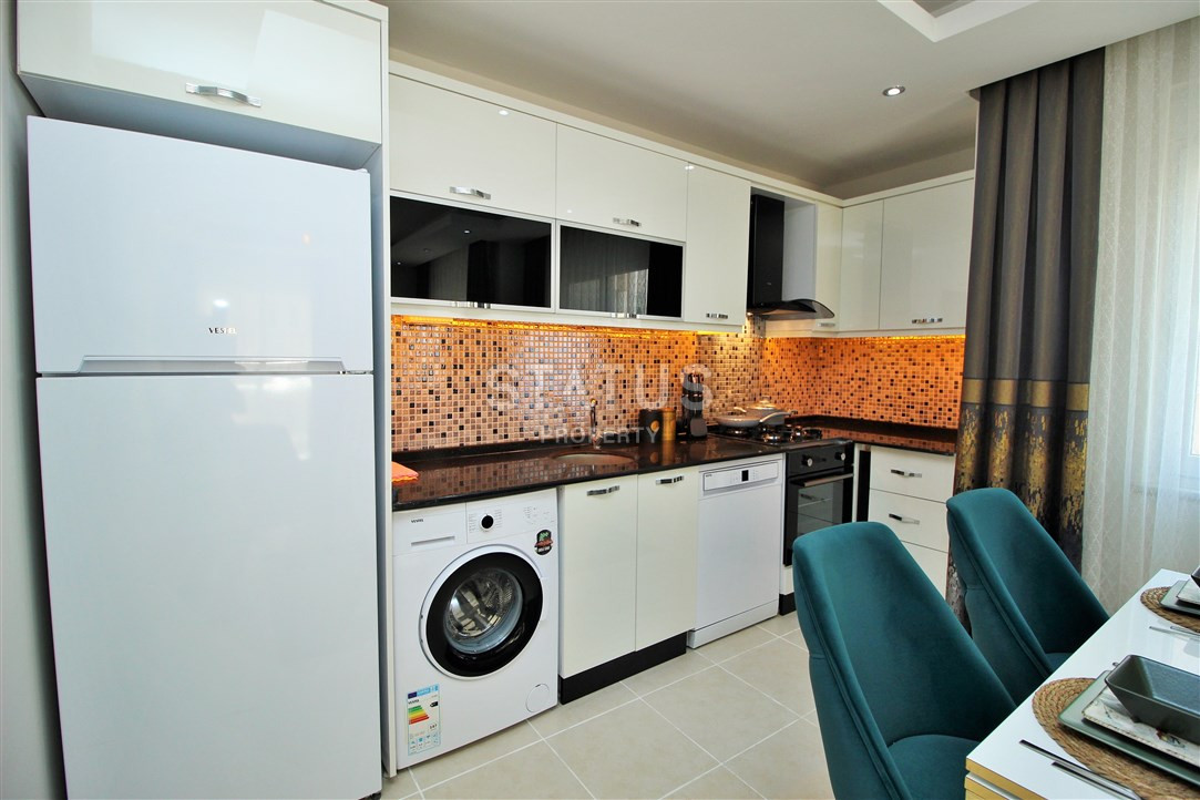 Меблированная квартира 1+1 в пяти минутах от моря, 60 м2. Махмутлар, Алания. фото 12