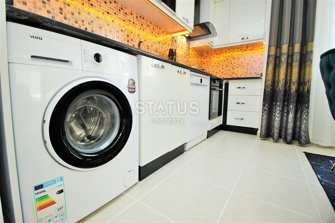 Меблированная квартира 1+1 в пяти минутах от моря, 60 м2. Махмутлар, Алания. фото 13