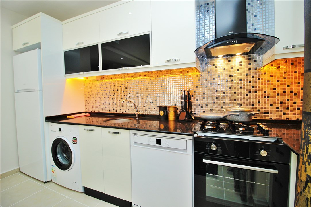 Меблированная квартира 1+1 в пяти минутах от моря, 60 м2. Махмутлар, Алания. фото 14