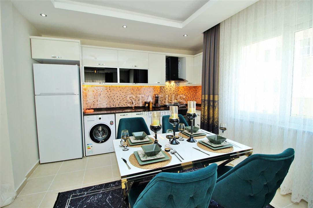 Меблированная квартира 1+1 в пяти минутах от моря, 60 м2. Махмутлар, Алания. фото 15