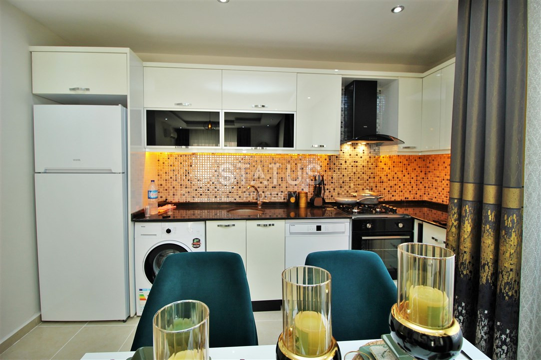 Меблированная квартира 1+1 в пяти минутах от моря, 60 м2. Махмутлар, Алания. фото 19