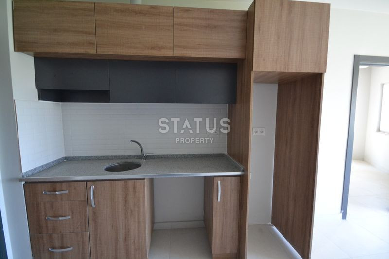 Бюджетная квартира 1+1 в Махмутларе, 50 кв.м. фото 27