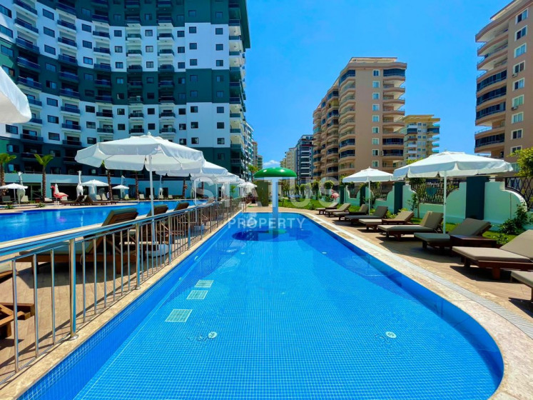 Квартира 1+1 в комплексе с отельной инфраструктурой в Махмутларе, 50 кв.м. фото 1