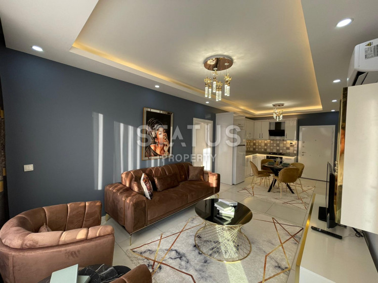 Квартира 2+1 с дизайнерским ремонтом и видом на море в Махмутларе, 105 кв.м. фото 1