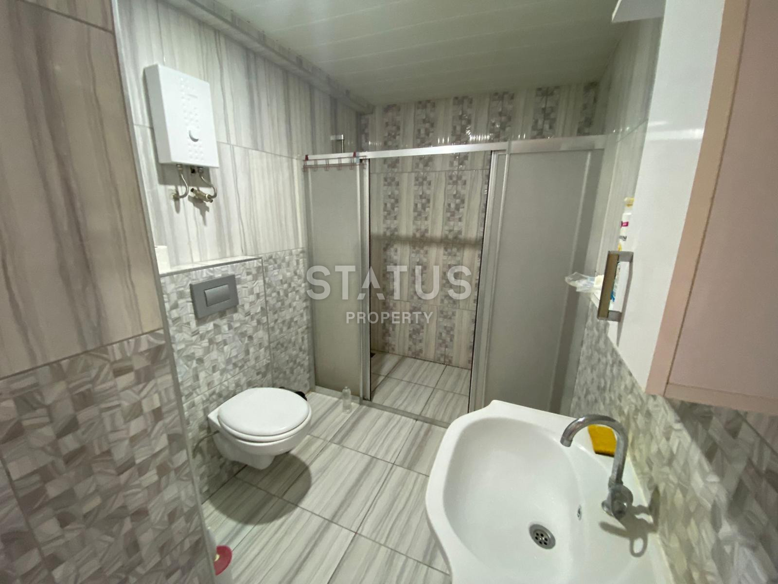 Просторная квартира 1+1 с мебелью в Махмутларе, 65 м2. фото 7